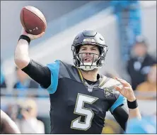  ?? [STEPHEN B. MORTON/THE ASSOCIATED PRESS] ?? Jaguars quarterbac­k Blake Bortles has been roundly criticized, and he rushed for more yards than he passed for in last week’s playoff win.