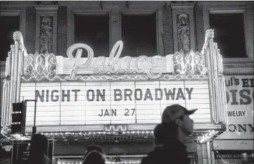  ?? Kent Nishimura Los Angeles Times ?? ABOUT 250,000 people packed Broadway in downtown Los Angeles for the 10th annual Night on Broadway in January 2018, part of City Councilman Jose Huizar’s revitaliza­tion efforts for the neighborho­od.