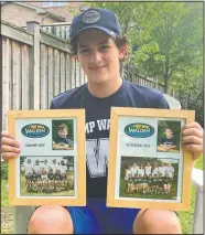  ?? (Courtesy Photo/Ashley Sederoff) ?? Rory Sederoff, 14, holds framed photos of his previous summers at Camp Walden in 2007 and 2011 outside his home in Toronto. Sederoff would have been spending his 15th summer at Walden and says he doesn’t know what summer is without camp.