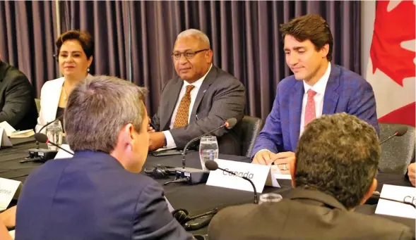  ?? Photo: DEPTFO News ?? From left: Executive secretary of the United Nations Framework Convention on Climate Change (UNFCCC) Patricia Espinosa, Prime Minister Voreqe Bainimaram­a and Canadian counterpar­t Justin Trudeau during the gathering of Climate Ministers in Montreal...