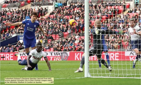  ?? — AFP ?? Tottenham Hotspur’s Davinson Sanchez ( second from left) scores against Leicester City in their Premier League match at the Wembley Stadium in London on Sunday.