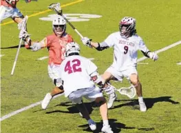  ?? BALTIMORE SUN KARL MERTON FERRON/ ?? “I feel it’s important to note that this year’s team is different from last year’s team. While there’s some similariti­es, we’re not that team, and we want to build our own legacy,” said Dom Pietramala, right, pictured Friday against Calvert Hall.