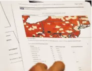  ?? Keith Srakocic / Associated Press 2017 ?? A map shows the rates of opioid prescripti­ons by county in Pennsylvan­ia and neighborin­g states.