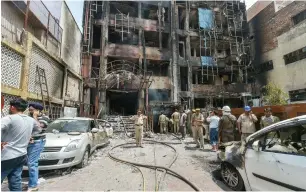  ?? PTI ?? Charred remains of Hotel Virat Internatio­nal which caught fire in Lucknow on Tuesday. —