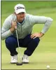  ?? FRANK GUNN / CANADIAN PRESS VIA AP ?? Wyndham Clark lines up his putt on the eighth green during the first round of the Canadian Open golf tournament in Toronto on Thursday.