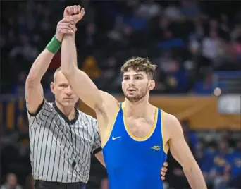  ?? Pitt athletics ?? PItt’s Holden Heller is seeded No. 1 at 165 pounds going into the ACC tournament.