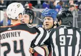  ?? Getty Images ?? IN TROUBLE: Brendan Lemieux mixes it up with Carter Rowney on Sunday.