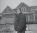  ?? TODD KOROL, THE CANADIAN PRESS ?? Flett is shown at his new Beacon Hill house. The house was rebuilt after he lost it to the ‘the beast’ last year in Fort McMurray.
