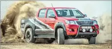  ??  ?? Meet Rex, the one-off Hilux bakkie built by Toyota Motorsport using a 5-litre 335kW Lexus V8 engine. And, no, you can’t buy it.