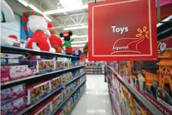  ?? Associated Press ?? ■ Toys sit on the shelves Nov. 9 at a Walmart Supercente­r in Houston. Pediatrici­ans say the best toys for young children are simple, old-fashioned toys like blocks and puzzles rather than costly electronic games or the latest high-tech gadgets. The advice is in a new report on selecting toys for young children in the digital era. It was published Monday by the American Academy of Pediatrics.