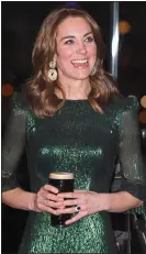  ??  ?? GREEN GODDESS: The Duchess of Cambridge in the Falconetti dress