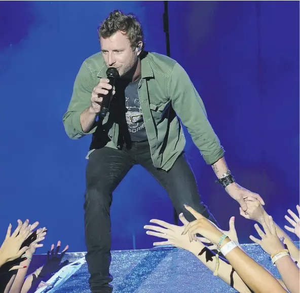  ?? — GETTY IMAGES FILES ?? ERIC VOLMERS Dierks Bentley has adapted to singing in stadium settings after a lifetime of playing small venues, but he’s maintained his sense of humility on his way to becoming an establishe­d star. Bentley brings his What the Hell tour to Rogers Arena...