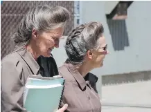  ?? THE CANADIAN PRESS ?? Gail Blackmore, left, leaves court with family members during a break in her sentencing hearing on Friday. She was convicted of taking a 13-year-old girl to the U.S. to marry the leader of a religious sect.