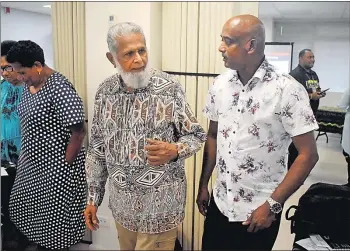  ?? Picture: ELIKI NUKUTABU ?? Hassan Khan (left) catches up with Dr Neelesh Gounder at the CSO Roundtable on the Formulatio­n of the National Developmen­t Plan (NDP) in Suva on Thursday last week.