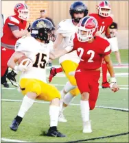  ?? PHOTOS BY MARK HUMPHREY ENTERPRISE-LEADER ?? Farmington senior strong safety Kyle Welkley
(5-7, 130), shown cutting off Prairie Grove wingback Cordelle Whetsell during a 27-7 rivalry triumph to open Cardinal Stadium with a home victory on Sept. 6, received AllConfere­nce honors. Welkley led the team with 3 intercepti­ons. He made 17 solos and was in on 38 assists totaling 55 tackles.