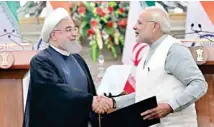  ?? PIC/ NAVEEN SHARMA ?? PM Modi with Iranian President Hassan Rouhania in New Delhi on Saturday