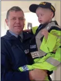  ??  ?? help: Garda Derek Rochford of Castleblay­ney with Ceejay