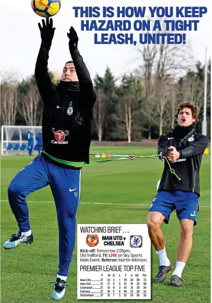  ?? GETTY IMAGES ?? At full stretch: Chelsea’s Marcos Alonso holds on to Eden Hazard in training yesterday
