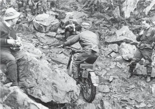  ??  ?? Above: Ray Sayer tackles some Bay Hill rocks on his Triumph Cub.
Below: Tony Holt was the other AJS rider to clean Devil's Staircase in 1961.