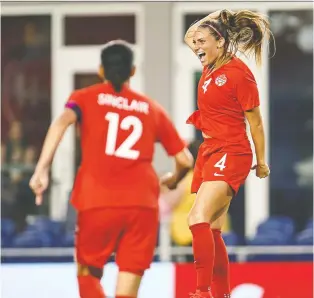  ??  ?? Shelina Zadorsky, right, shown celebratin­g a goal in February, and fellow Canadian Erin Mcleod will be among the first pro athletes to return to play in North America with the NWSL Challenge Cup later this month.