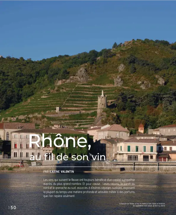  ?? © Jean-Luc Barde ?? À Tournon-sur-Rhône, la tour, le château et des vignes en terrasses de l’appellatio­n saint-joseph.