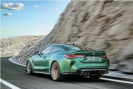  ?? ?? Above left: The race-focused M4 CS has all-wheel drive and lots of styling attitude. Above: The top speed is raised to 302km/h. Left: M Carbon bucket seats are upholstere­d in Merino leather with a black/red colour scheme and distinctiv­e contrast stitching.