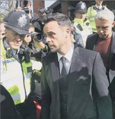  ??  ?? OFF THE ROAD: Ant McPartlin leaves Wimbledon Magistrate­s’ Court after being sentenced for driving while more than twice the legal limit.