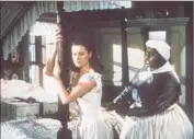  ?? New Line Cinema ?? READERS have plenty to say about “Gone With the Wind,” with Vivien Leigh, left, and Hattie McDaniel.