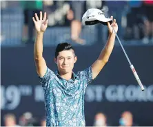  ?? PETER MORRISON, THE ASSOCIATED PRESS ?? American Collin Morikawa celebrates on the 18th green after winning the British Open at Royal St. George’s in Sandwich, England, on Sunday.