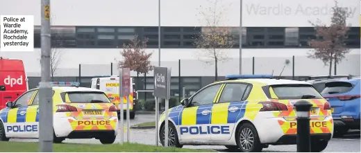  ??  ?? Police at Wardle Academy, Rochdale yesterday