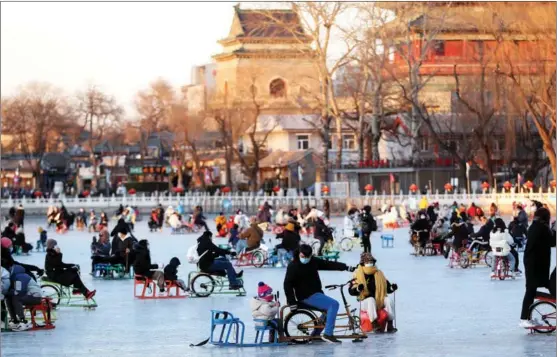  ?? ZOU HONG / CHINA DAILY ?? Shichahai, a popular scenic area in Beijing, is a venue for a wide range of winter activities.