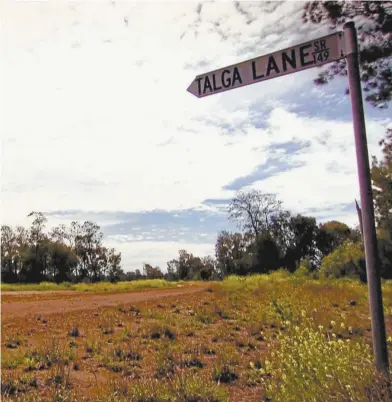  ??  ?? The Talga Lane turnoff, towards Croppa Creek, NSW, seen in Gregory Miller’s documentar­y film Cultivatin­g Murder.