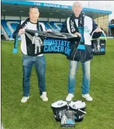  ?? ?? AT THE READY: Gillingham fan Justin Foote, left, is walking to Charlton on Tuesday