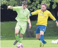  ??  ?? Action from Occidental’s (yellow) 3-2 victory over FC Spartak in the Summer League.