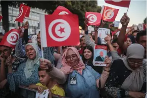 ?? Associated Press ?? ■ Supporters of independen­t Tunisian Presidenti­al candidate Kais Saied attend a rally Friday on the last day of campaignin­g before the second round of the presidenti­al elections, in Tunis, Tunisia.
