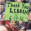  ?? TONY DEJAK/ASSOCIATED PRESS ?? A Cleveland fan holds up a sign thanking the Lakers’ LeBron James for leading the Cavs to the 2016 NBA title.