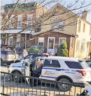  ??  ?? RESIDENT EVIL: Police gather at suspect Akayed Ullah’s home in Flatlands, Brooklyn, after Monday morning’s Midtown blast. Ullah was said to have been living there with his parents.