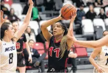  ?? David Larkins • University of Winnipeg ?? University of Winnipeg Wesmen women’s basketball player Jillian Duncan in action.