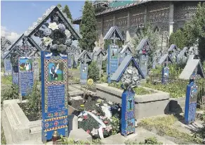  ?? RICK STEVES ?? This irreverent “Merry Cemetery” in the north of Romania is a celebratio­n of life.