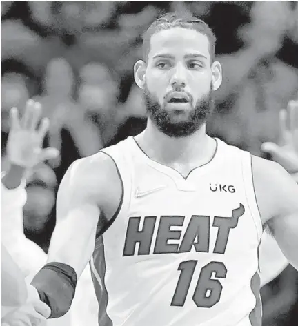  ?? LYNNE SLADKY/AP ?? Caleb Martin again is energizing the Heat with his energy and perseveran­ce.