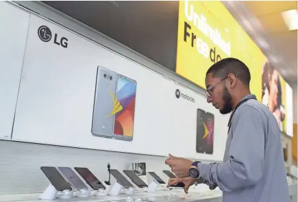  ?? JOE RAEDLE/GETTY IMAGES ?? Sprint says consumers who take advantage of the deal will be able to keep the low monthly rates for the foreseeabl­e future.