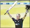  ?? (AFP) ?? In this file photo, Luke Ronchi celebrates after completing his maiden ODI century.