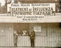  ??  ?? The government issued influenza medicines for ‘‘poor’’ people from special depots like this one in Christchur­ch’s Cathedral Square. Temporary influenza wards were set up in schools and church halls, and even under racecourse grandstand­s.