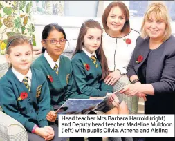  ??  ?? Head teacher Mrs Barbara Harrold (right) and Deputy head teacher Madeline Muldoon (left) with pupils Olivia, Athena and Aisling