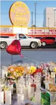  ?? NEW YORK TIMES NEWS SERVICE FILE PHOTO ?? A memorial to the victims of the mass shooting is seen in Las Vegas on Oct. 3. Unusual among mass killers, Stephen Paddock left an estate of about $5 million behind — large enough to prompt victims to ask Nevada courts to set up an estate so that the...