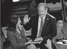  ?? Associated Press file photo ?? Attorney General Ken Paxton is joined by his wife, state Sen. Angela Paxton, as he is sworn in for a third term last month.