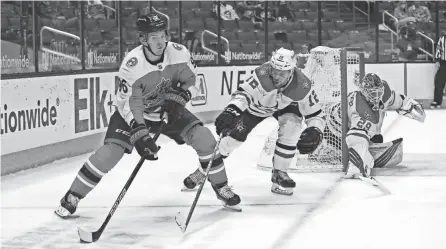  ?? KYLE ROBERTSON/COLUMBUS DISPATCH ?? Blue Jackets center Jack Roslovic, shown in a game against the Stars on March 13, was slated to be a healthy scratch against the Panthers on Saturday.
