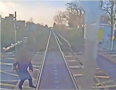 Safety warning after near miss at level crossing - PressReader