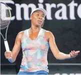  ?? VINCENT THIAN/ ASSOCIATED PRESS ?? Venus Williams reacts during her match today with Belinda Bencic. The fifth-seeded Williams lost 6-3, 7-5.