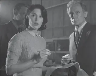  ?? NICOLA DOVE, THE ASSOCIATED PRESS ?? Gemma Arterton, left, plays a clever screenwrit­er who navigates the all-male culture of the British Ministry of Informatio­n’s film department in "Their Finest." Bill Nighy, right, plays a has-been star.